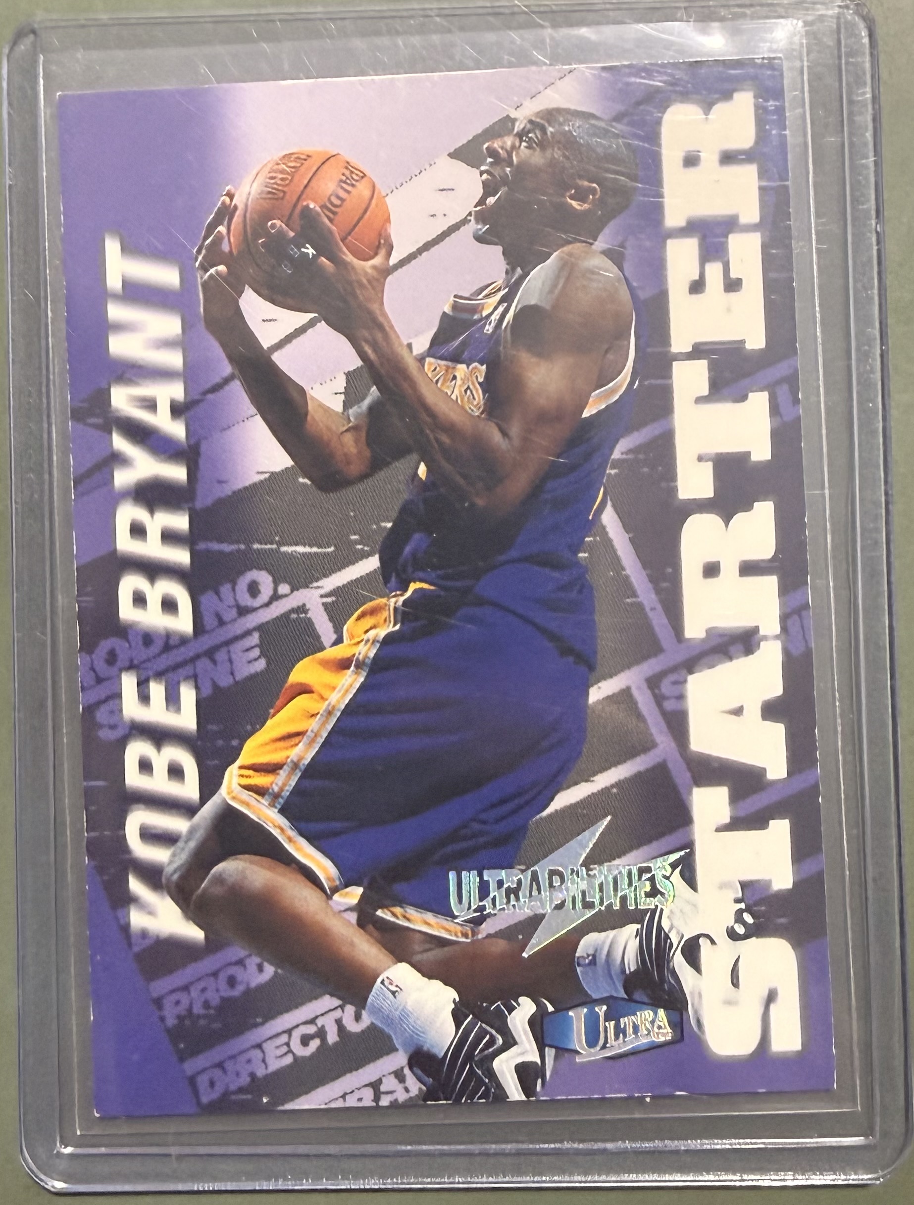 1997-98 Fleer Ultra Ultrabilities Starter Kobe Bryant #3-S Insert – LA Lakers